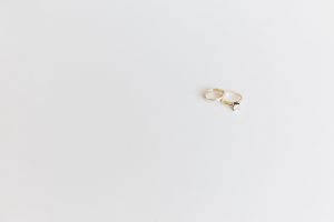 wedding and engagement ring on white background, wedding insurance tips